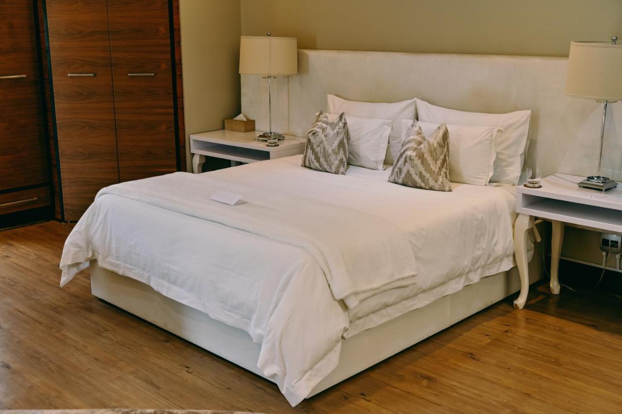 Tredenham Boutique Hotel ブルームフォンテーン エクステリア 写真 A bed